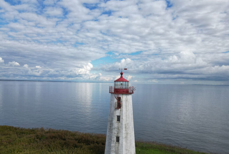 A lighthouse overlooking the ocean in Guilford, CT